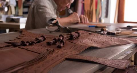 Mr Ripiero making a chap in his workshop